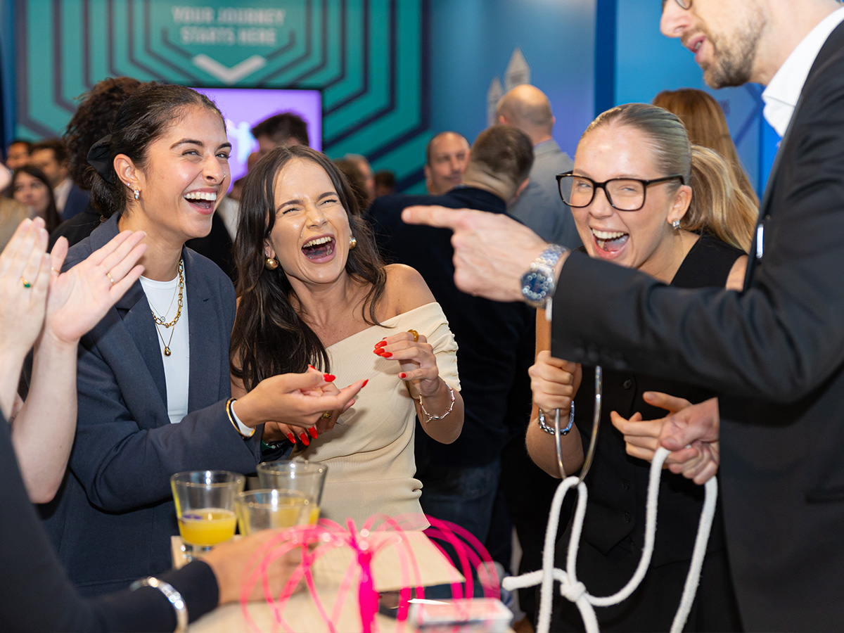 A group of people is having fun at an event at Museum of Illusions.
